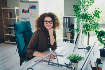 Photo of gorgeous successful woman business lady modern workstation office indoors