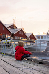 Fototapeta premium Family with children and pet dog, visiting nortern cities in Sweden, Lulea