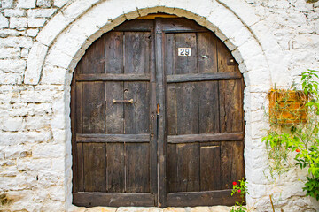 The famous old town of Berat in Albania. Picturesque street with houses from the Ottoman era. Beautiful landscape in central Albania.