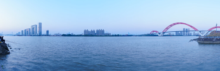 Panoramic view of the Pearl River in Guangzhou with riverfront city skyscrapers