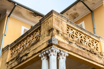 Detail of facade of old and abandoned residential house in city of Brazil