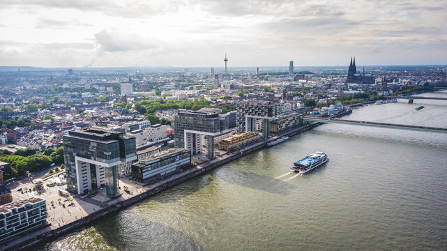 Aerial view of the Rhein River, with the Cologne Cathedral in the background, Germany - Powered by Adobe