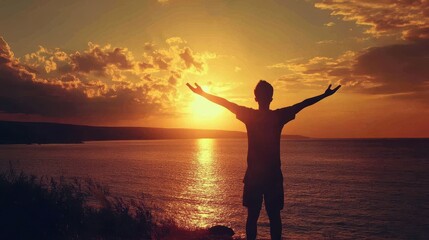 Fototapeta premium Embracing Freedom: Person Standing in Sunset with Arms Open Wide, Symbolizing Liberation and Tranquility