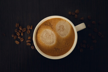 cup of coffee with beans