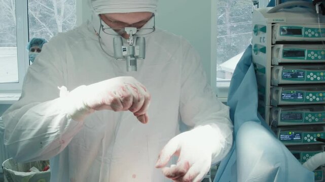 Surgeon meticulously closes chest incision. Doctor uses absorbable sutures to seal facial layer ensuring proper closure after coronary artery bypass operation