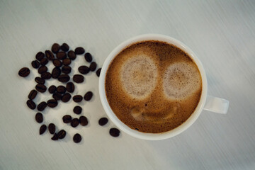 cup of coffee with beans