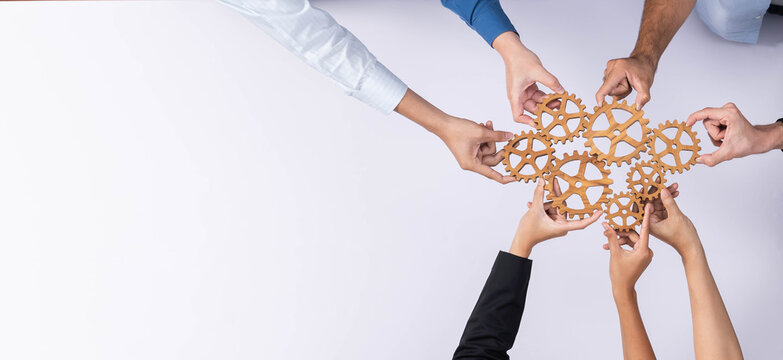 Top panorama banner of business team joining cogwheel in circular together symbolize successful group of business partnership and collective teamwork in workplace with productive efficiency. Prudent