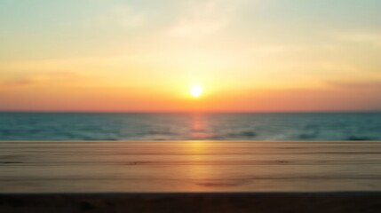 Fototapeta premium A serene sunset over the ocean, viewed from a wooden surface.