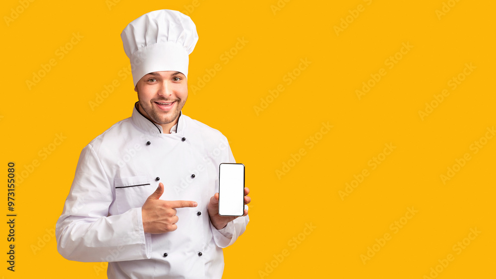 Aufkleber smiling chef man showing smartphone empty screen recommending food delivery mobile app standing over