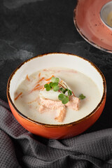 Creamy Fish Soup in Earthy Tones with Fresh Garnish - Elegant Food Photography Highlighting Smooth Texture and Subtle Lighting