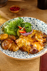 Hearty Braised Beef with Cheese Topping and Crispy Potatoes – Rustic Food Photography