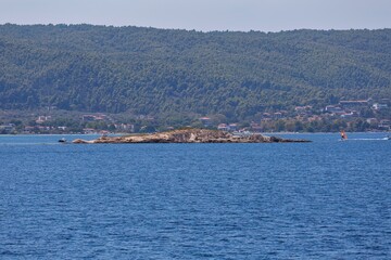 view from the sea and hills in Diaporos Island, Sithonia - Greece