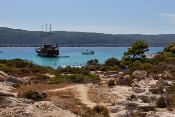 boat in the blue lagoon in Diaporos Island, Sithonia - Greece