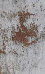 Texture of a white metal sheet with rust in the centre