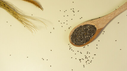 Close up of wooden spoonful of coriander
