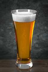Glass of beer on wooden table against the wall in grunge style. Bar theme.  Dark environment. 3d rendering.