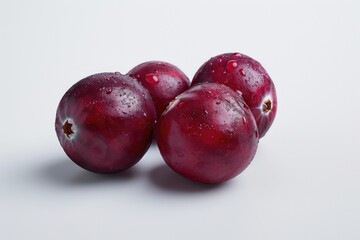 Fresh plums arranged on a table, ideal for fruit arrangements or still life photography