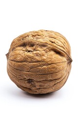 Fototapeta premium A single walnut shell on a white background, perfect for product or texture photography