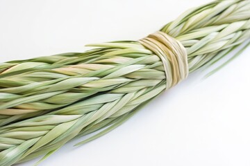 A close-up image of a braided sweet grass bundle. It's a natural, earthy material with a pleasant aroma, perfect for crafting and smudging ceremonies.