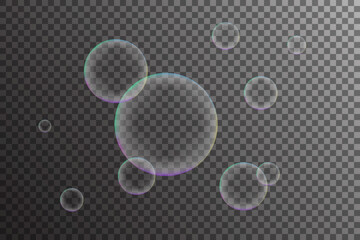 Realistic flying soap bubbles composition with rainbow reflection. Vector illustration on transparent