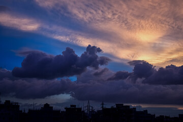 Evening sky with deep cloud at City area with buildings