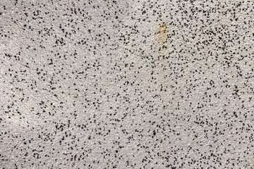 White with black stone rough cast wall background texture ideal graphic design element