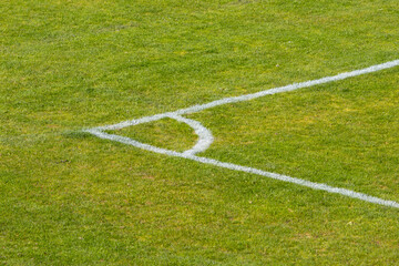 Obraz premium Green Soccer Field or Football Field Corner View with Grass Texture and Pattern, Football Pitch