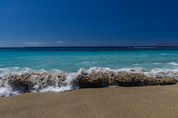 Yellow sand beach, dangerous high waves, rough Atlantic Ocean, famous Playa del Duque Teneriffe Costa Adeje