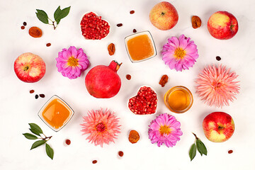 Autumn banner with honey, apples, pomegranates, flowers, dried fruits on marble background,...