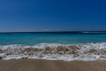 Yellow sand beach, dangerous high waves, rough Atlantic Ocean, famous Playa del Duque Teneriffe Costa Adeje