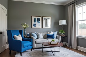 Modern Cozy Den Featuring Blue Armchair and Soft Grey Wall in Interior Design