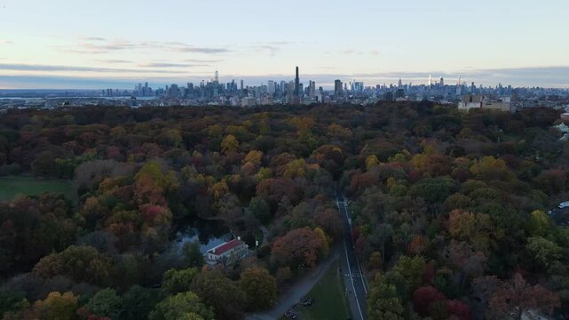 Aerial landscape of Prospect Park lake and Brooklyn Manhattan Skylines during fall in New York City