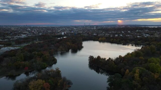 Aerial landscape of Prospect Park lake and Brooklyn Manhattan Skylines during fall in New York City