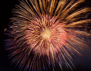 Isolated fireworks with depth of field capturing vibrant colors and festive atmosphere