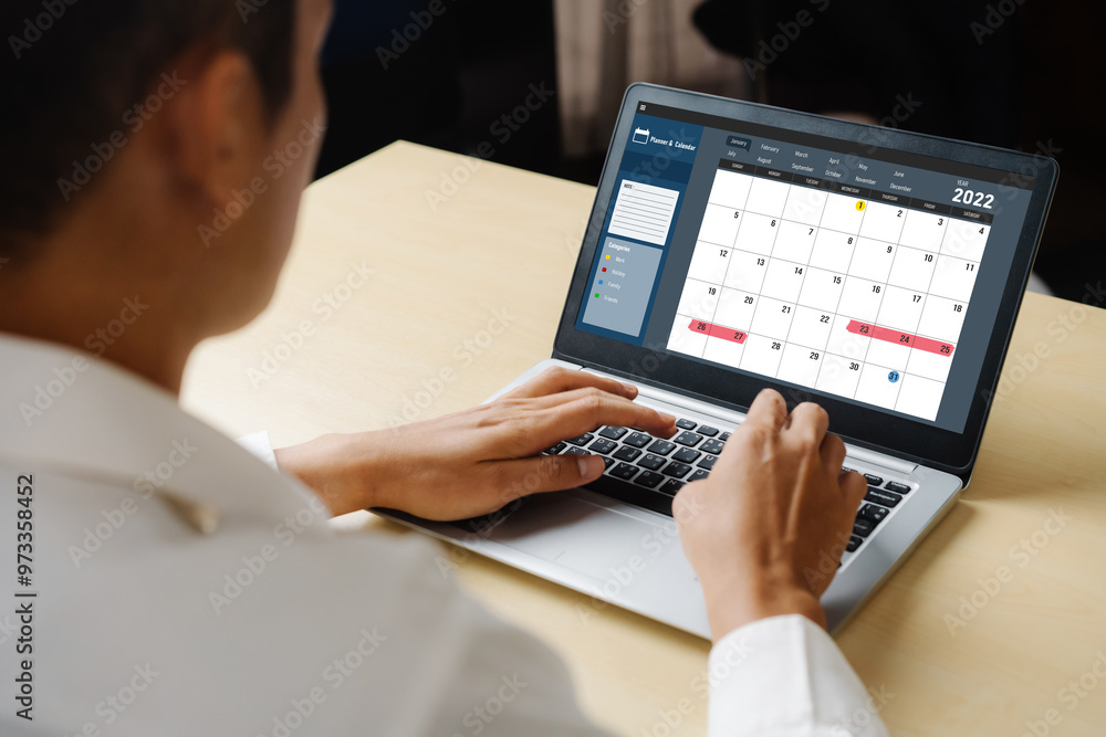 Poster calendar on computer software application for modish schedule planning for personal organizer and on
