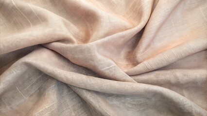 Soft textured fabric in light beige tones, draped background, with copy space