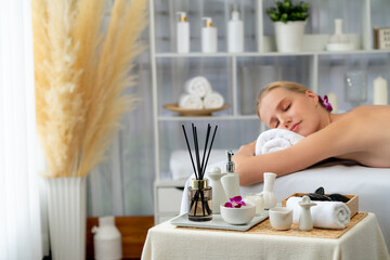 Caucasian woman customer enjoying relaxing anti-stress spa massage and pampering with beauty skin...