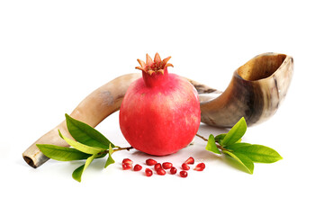 Pomegranates and shofar symbol of the Jewish holiday-Rosh Hashanah white background.