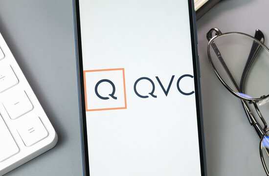 New York, USA - 30 August 2024: QVC Logo on Phone Screen, Company Icon on Display
