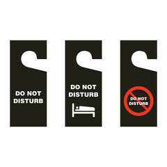 Assorted black do not disturb door hanger tags on a white background