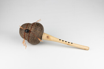 Handcrafted Coconut Shell Rattle Percussion Instrument Isolated on White Background (Easily...
