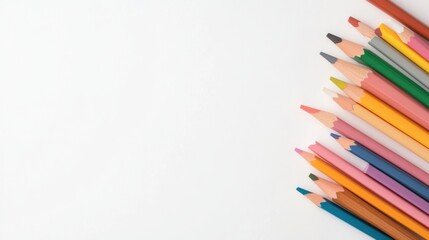 Fototapeta premium A row of colored pencils on a white background with copy space, AI