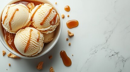 Scoops of ice cream with caramel sauce and cone on white marble table, closeup. Space for text