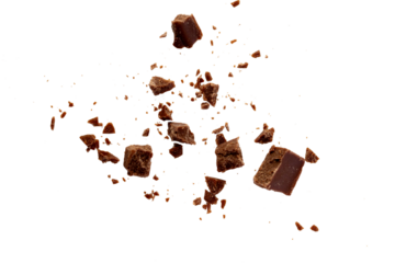 Broken chocolate pieces on white background.Chocolate chips . Ingredients for dessert recipes.Recipe magazines and cookbooks 