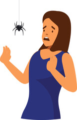 Terrified young woman is staring at a spider hanging from its web