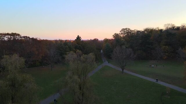 Aerial landscape of Prospect Park lake and Brooklyn Manhattan Skylines during fall in New York City