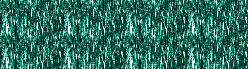 shimmering straight tinsel garland curtain texture in a solid metallic neon green color