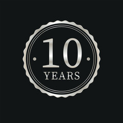 Fototapeta premium 10 years for celebration events, anniversary, commemorative date. metallic beige ten years logo badge stamp