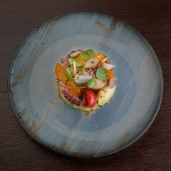 octopus serving on circular plate 