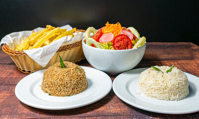 chaufa rice, white rice, french fries and fresh salad
